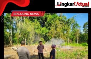 Polsek Lotu Melaksanakan Pengecek Titik Lokasi Api Yang Terpantau Di Aplikasi Lancang Kuning Di Desa Hiligeo Afia