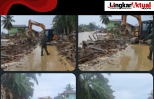 Babinsa Terus Kawal Alat Berat Bersihkan Jalan Agar Mudah Di Lalui Pasca Banjir